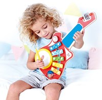 Hape instrumento musical 6-en-1 guitarra de juguete de madera para niños