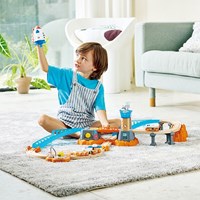 Hape tren de juguete Mars launch rail con pegatinas que brillan en la oscuridad